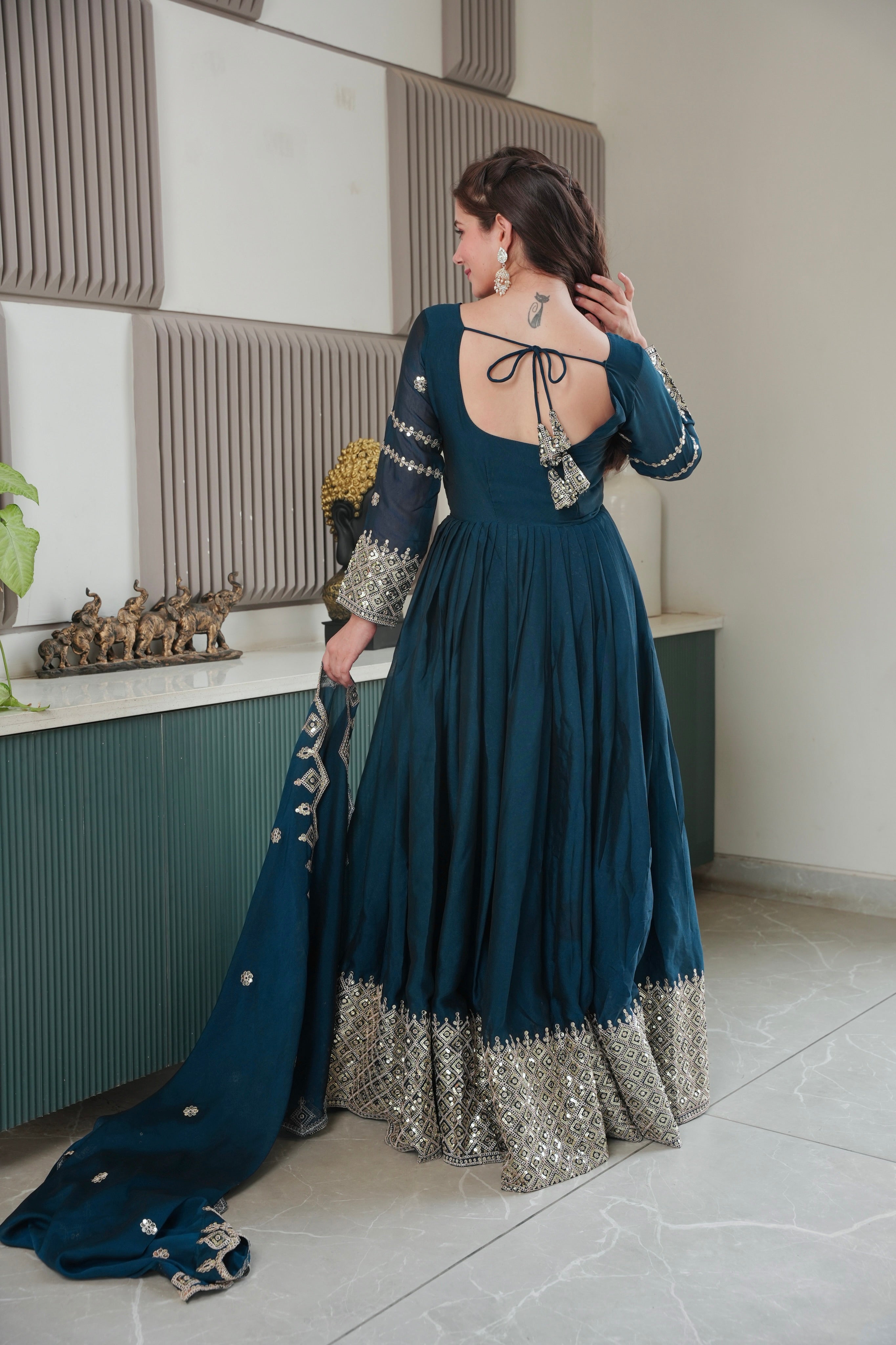 Designer Plum Floor-Length Anarkali Suit with Intricate Golden Embroidery, Heavy Zari Border, and Matching Dupatta – Perfect for Weddings, Parties & Festive Occasions