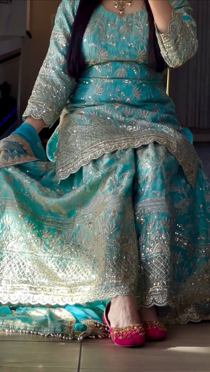 Women’s Designer Pink Sharara Suit Set with Heavy Golden Embroidery, Short Kurta and Flared Sharara Pants with Orange Dupatta – Perfect for Wedding, Party and Festive Wear