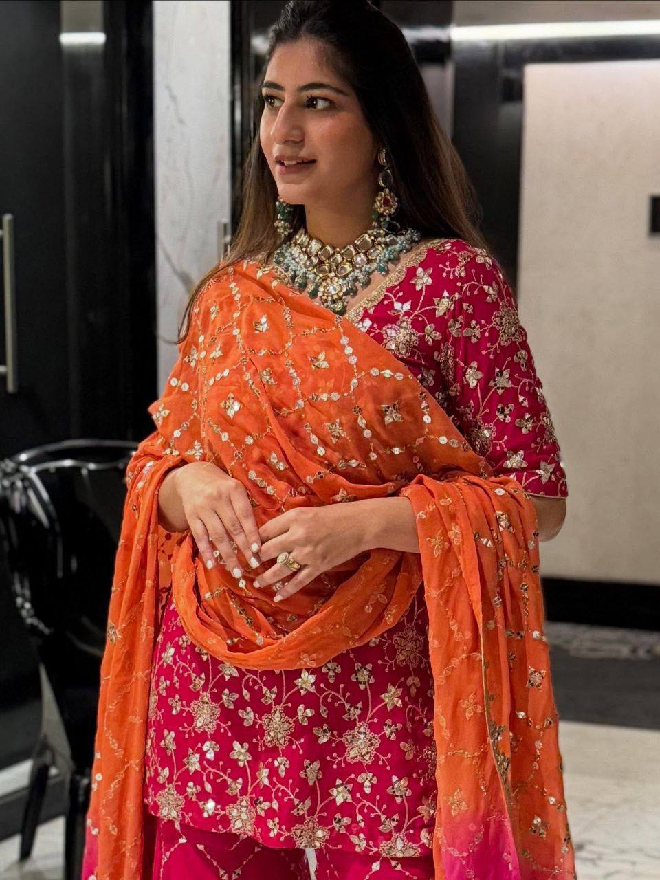 Women’s Designer Pink Sharara Suit Set with Heavy Golden Embroidery, Short Kurta and Flared Sharara Pants with Orange Dupatta – Perfect for Wedding, Party and Festive Wear