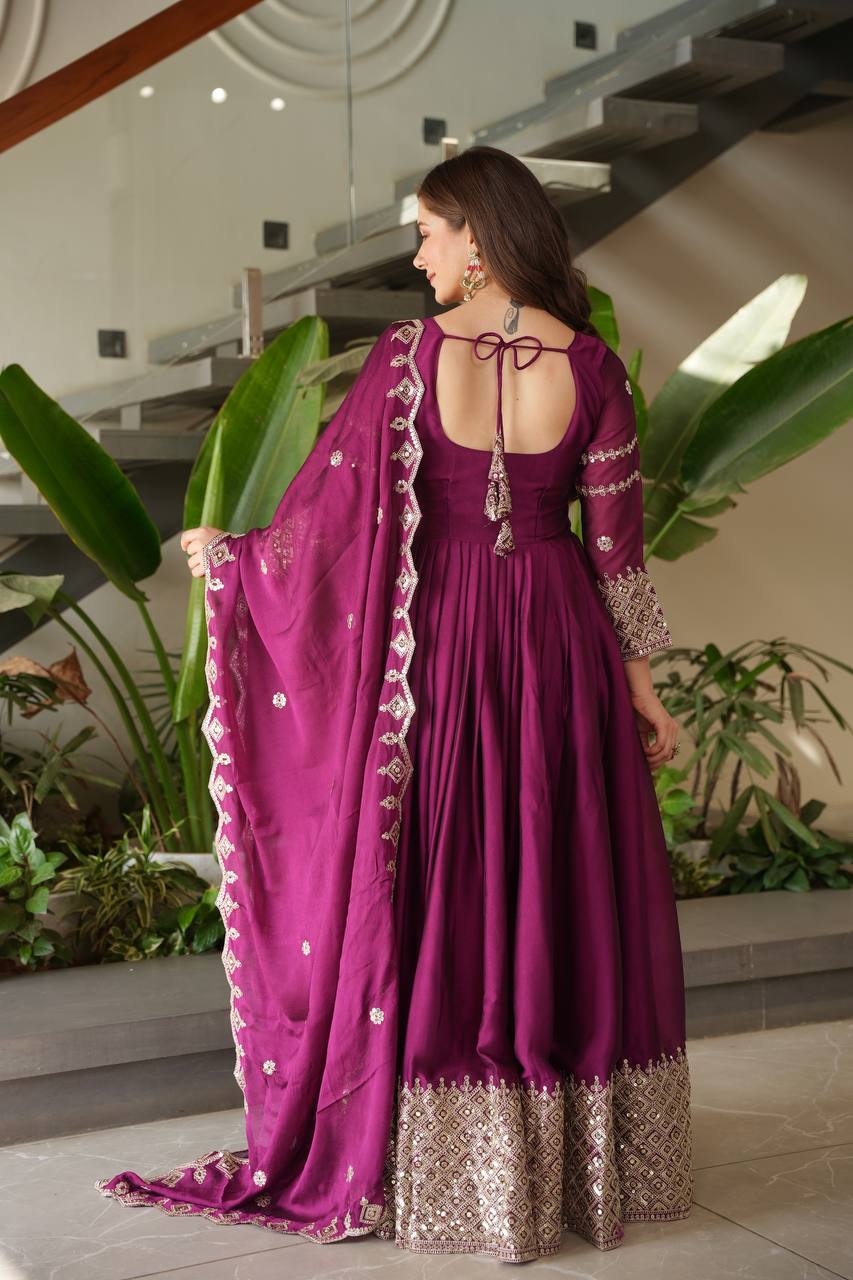 Designer Plum Floor-Length Anarkali Suit with Intricate Golden Embroidery, Heavy Zari Border, and Matching Dupatta – Perfect for Weddings, Parties & Festive Occasions