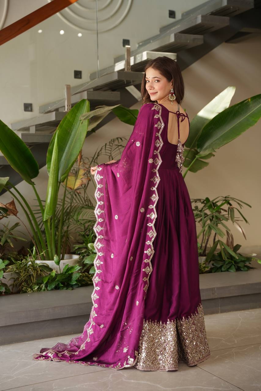 Designer Plum Floor-Length Anarkali Suit with Intricate Golden Embroidery, Heavy Zari Border, and Matching Dupatta – Perfect for Weddings, Parties & Festive Occasions