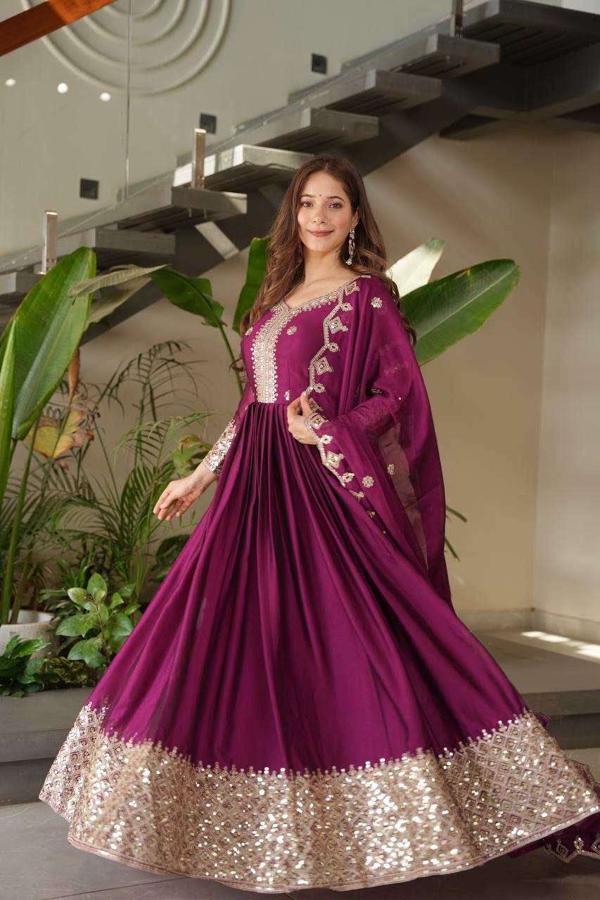 Designer Plum Floor-Length Anarkali Suit with Intricate Golden Embroidery, Heavy Zari Border, and Matching Dupatta – Perfect for Weddings, Parties & Festive Occasions