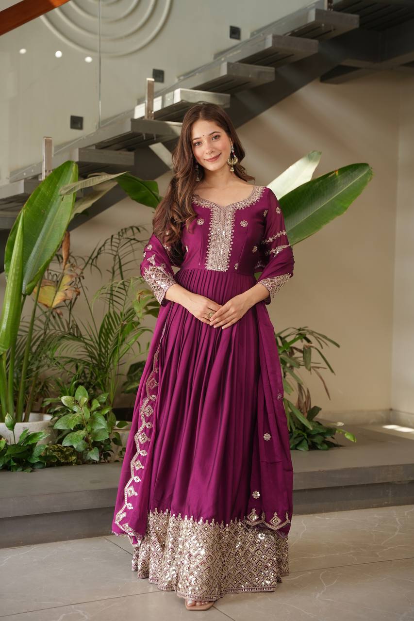 Designer Plum Floor-Length Anarkali Suit with Intricate Golden Embroidery, Heavy Zari Border, and Matching Dupatta – Perfect for Weddings, Parties & Festive Occasions