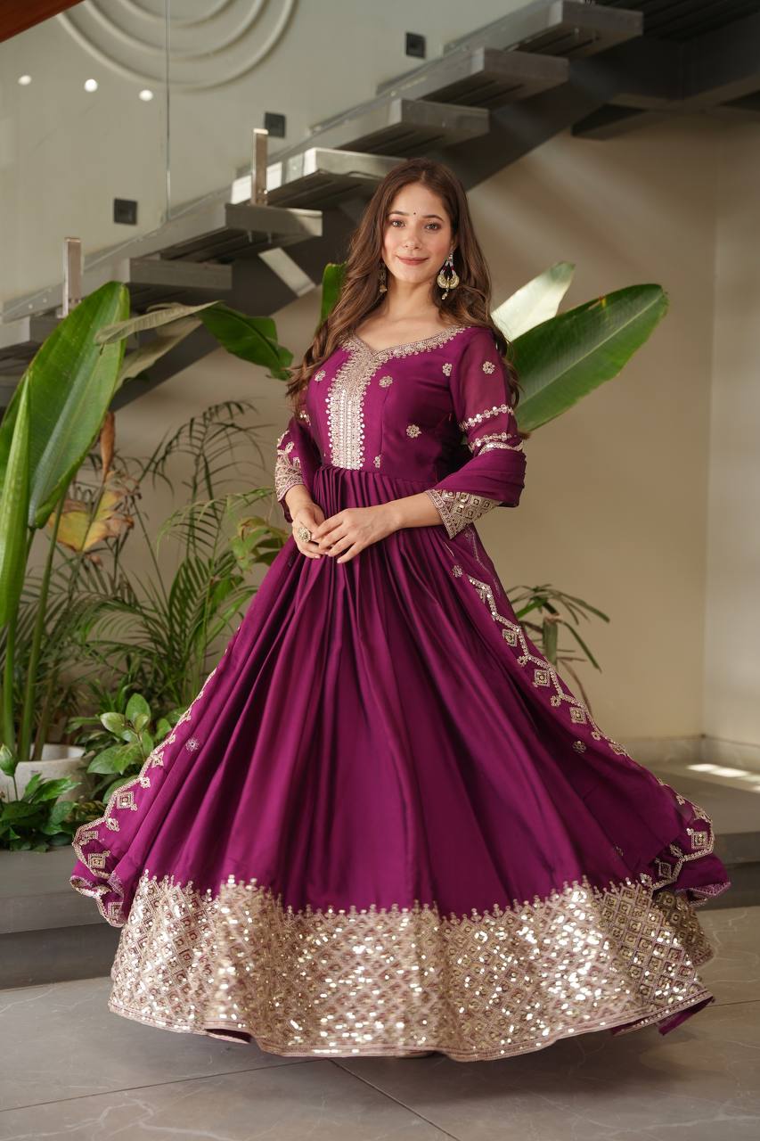 Designer Plum Floor-Length Anarkali Suit with Intricate Golden Embroidery, Heavy Zari Border, and Matching Dupatta – Perfect for Weddings, Parties & Festive Occasions