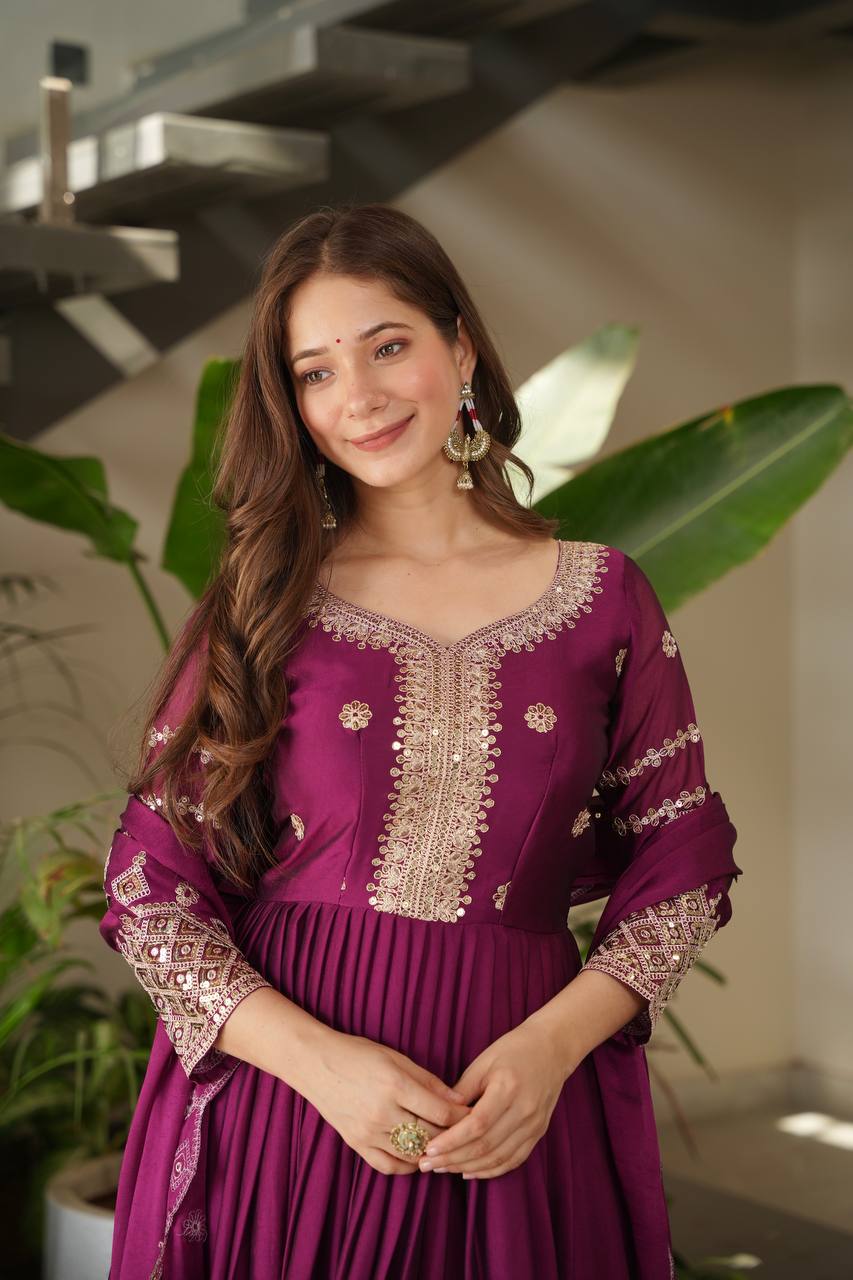 Designer Plum Floor-Length Anarkali Suit with Intricate Golden Embroidery, Heavy Zari Border, and Matching Dupatta – Perfect for Weddings, Parties & Festive Occasions