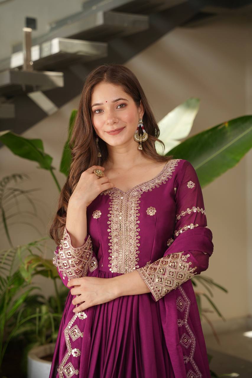 Designer Plum Floor-Length Anarkali Suit with Intricate Golden Embroidery, Heavy Zari Border, and Matching Dupatta – Perfect for Weddings, Parties & Festive Occasions