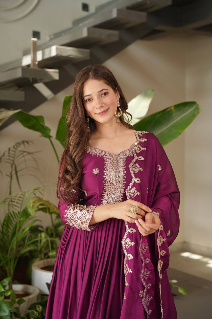 Designer Plum Floor-Length Anarkali Suit with Intricate Golden Embroidery, Heavy Zari Border, and Matching Dupatta – Perfect for Weddings, Parties & Festive Occasions