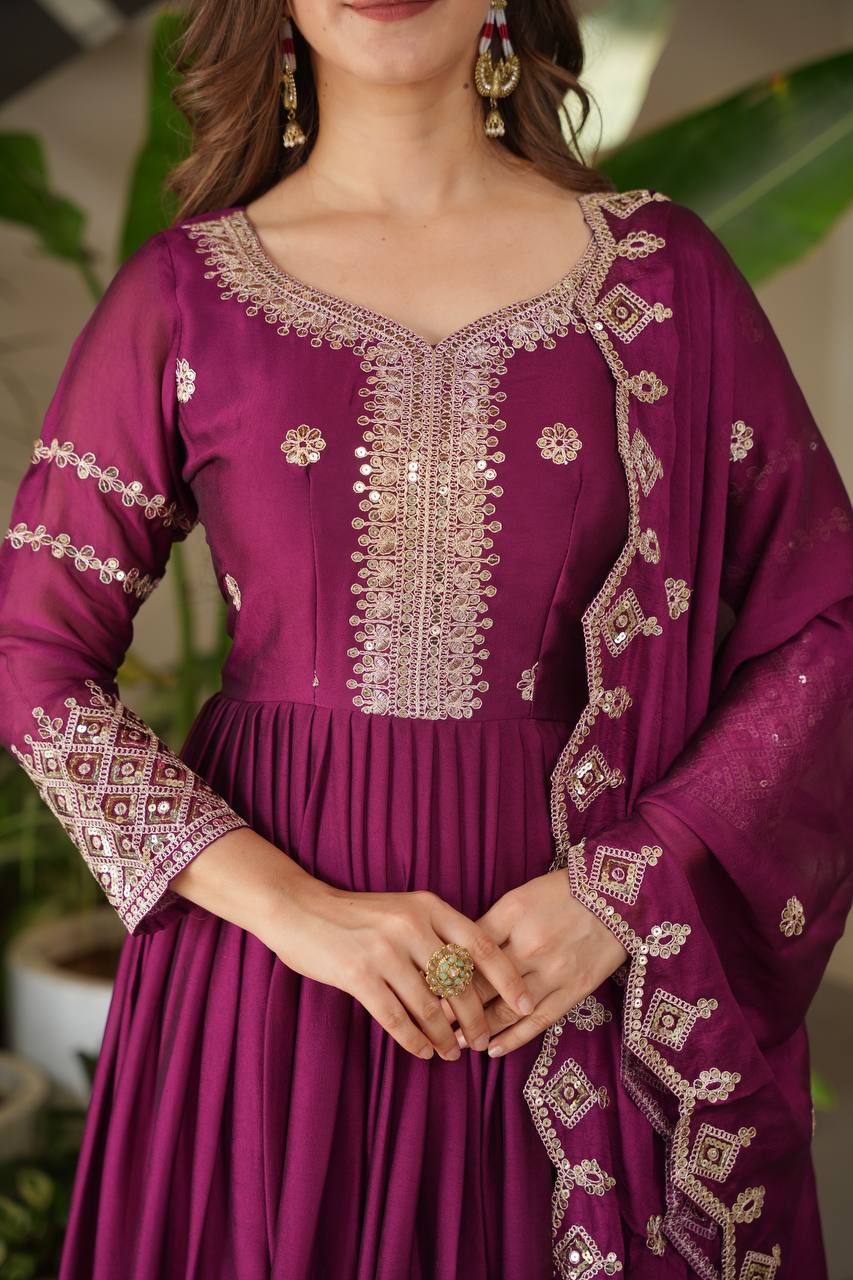 Designer Plum Floor-Length Anarkali Suit with Intricate Golden Embroidery, Heavy Zari Border, and Matching Dupatta – Perfect for Weddings, Parties & Festive Occasions