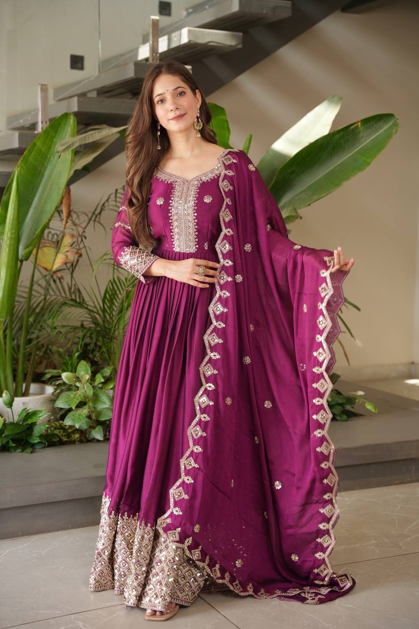 Designer Plum Floor-Length Anarkali Suit with Intricate Golden Embroidery, Heavy Zari Border, and Matching Dupatta – Perfect for Weddings, Parties & Festive Occasions