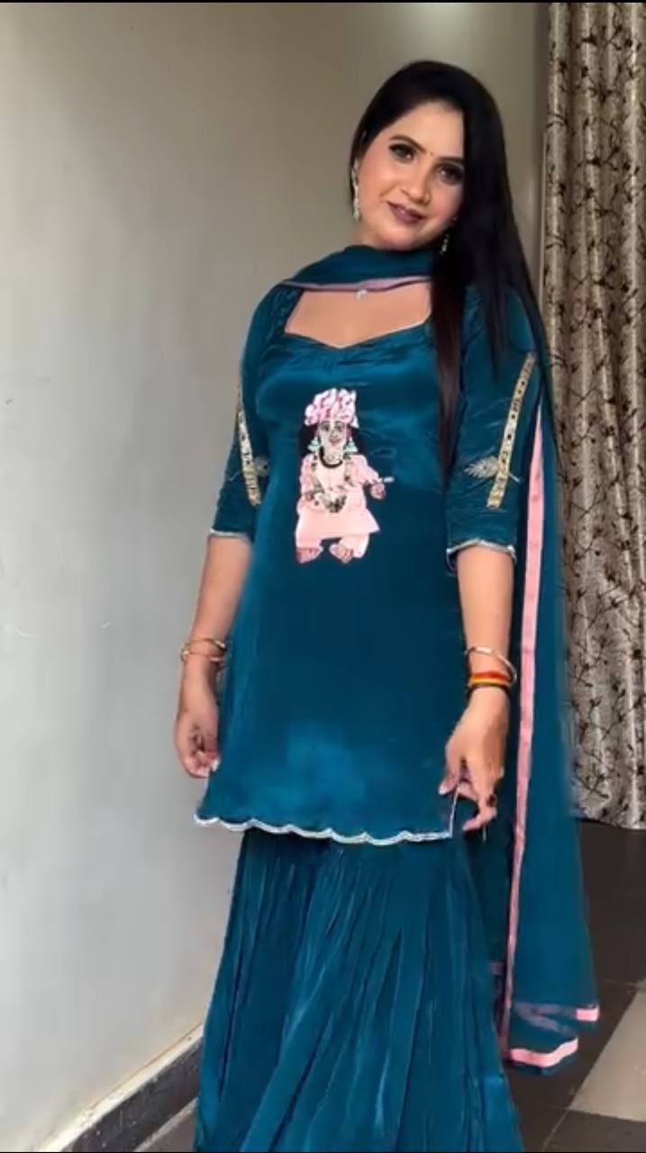 it's a stylish Indo-western ethnic set with a devotional (Krishna ) and modern flair