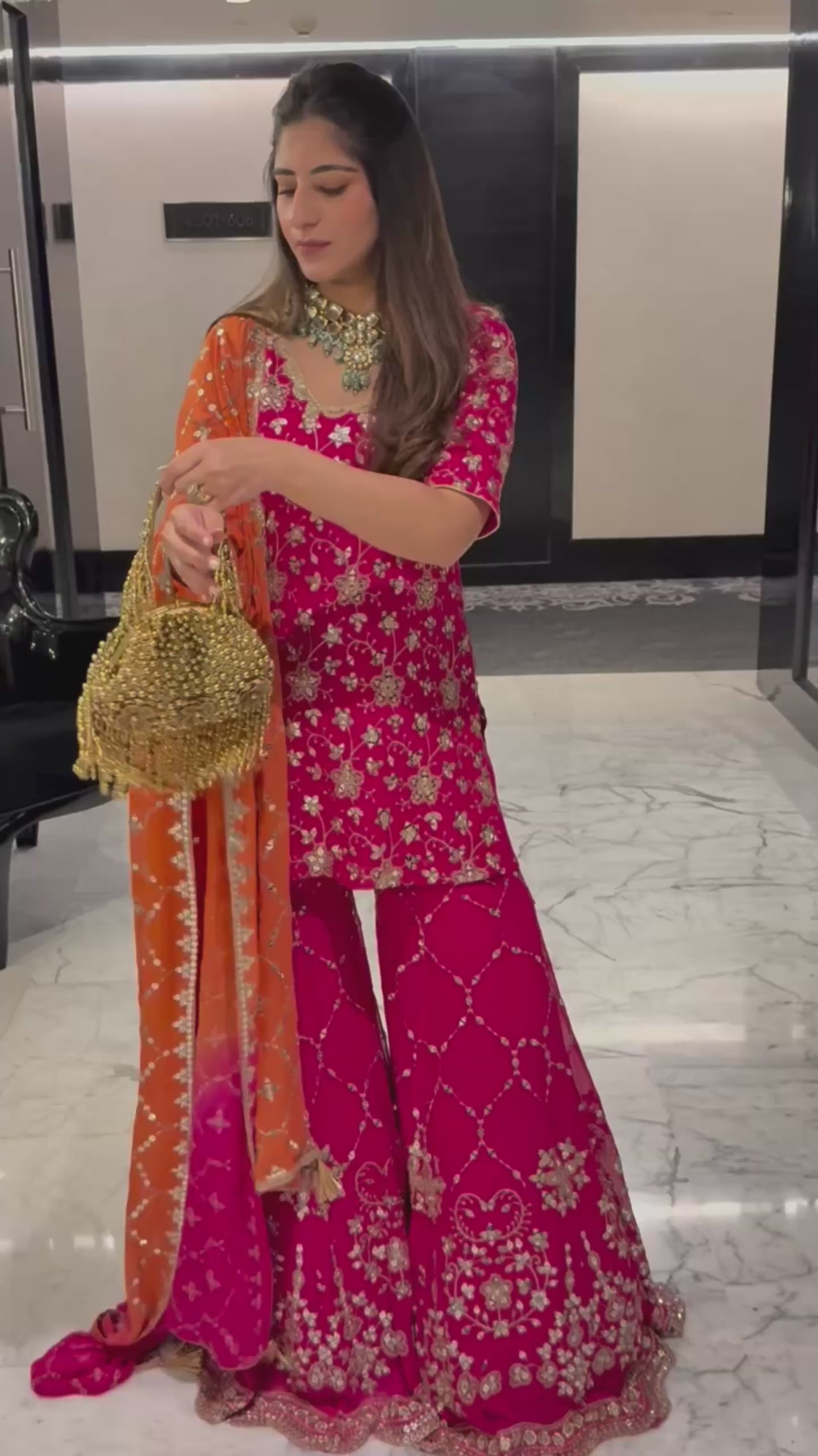 Women’s Designer Pink Sharara Suit Set with Heavy Golden Embroidery, Short Kurta and Flared Sharara Pants with Orange Dupatta – Perfect for Wedding, Party and Festive Wear