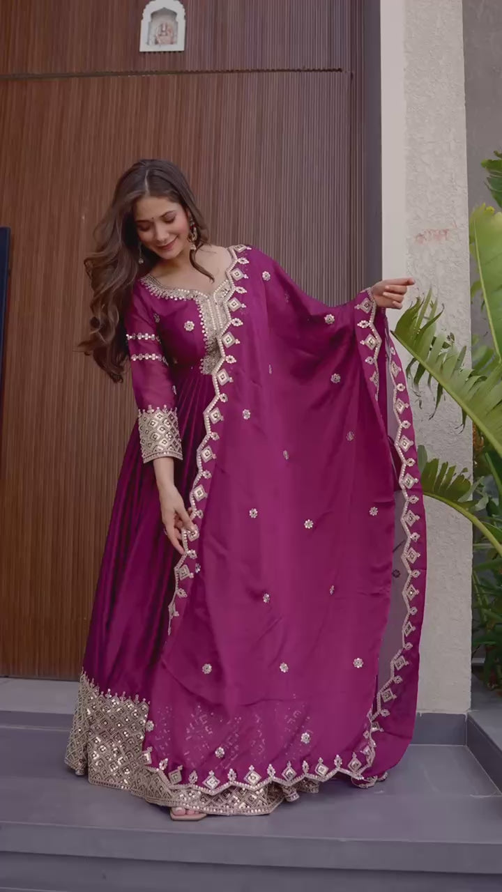 Designer Plum Floor-Length Anarkali Suit with Intricate Golden Embroidery, Heavy Zari Border, and Matching Dupatta – Perfect for Weddings, Parties & Festive Occasions