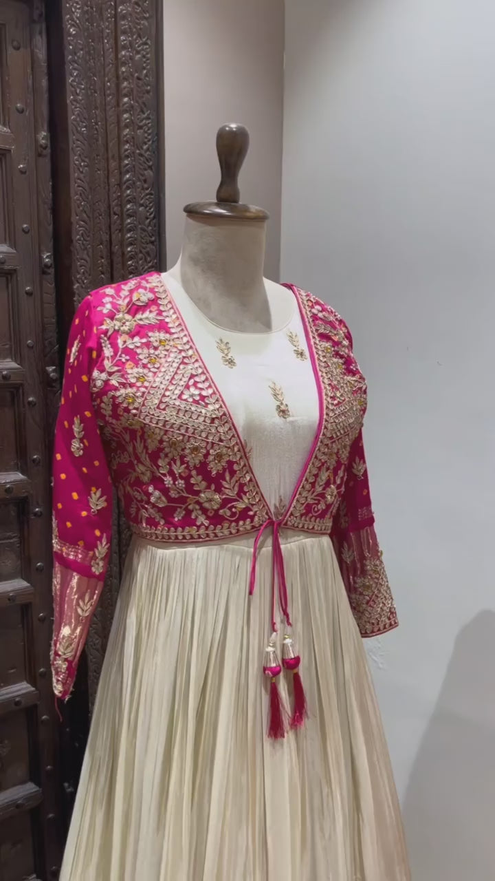 Designer Ivory Floor-Length Anarkali Gown with Contrast Pink Embroidered Jacket, Intricate Thread & Zari Work Detailing – Perfect for Weddings, Parties & Festive Celebrations